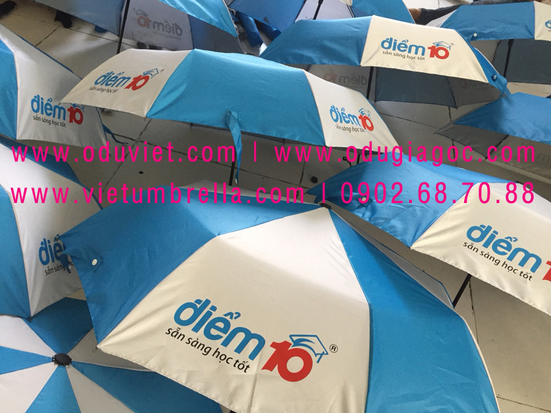 xưởng sản xuất ô dù cầm tay in logo quảng cáo